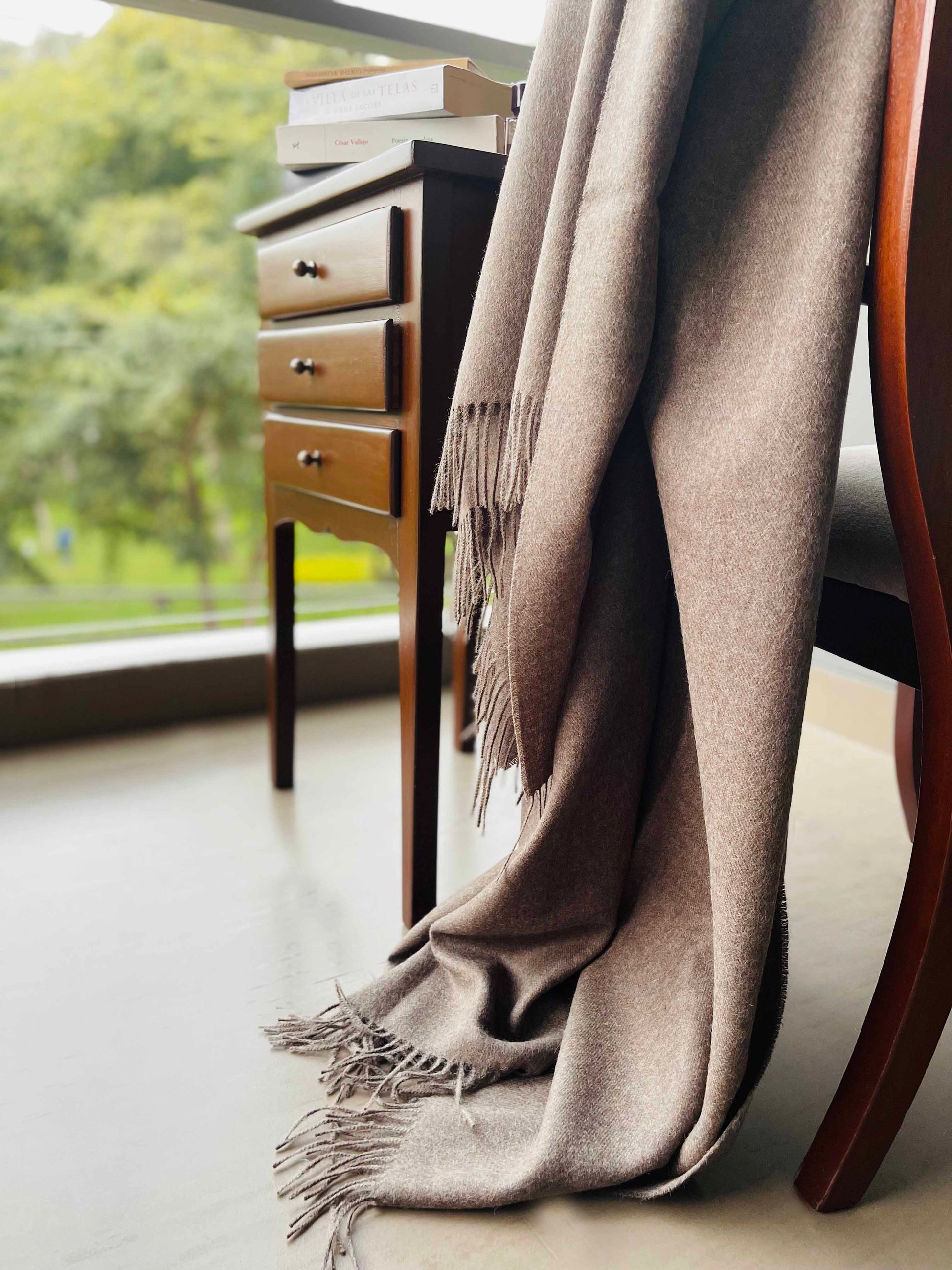 Blanket from alpaca wool in brown color