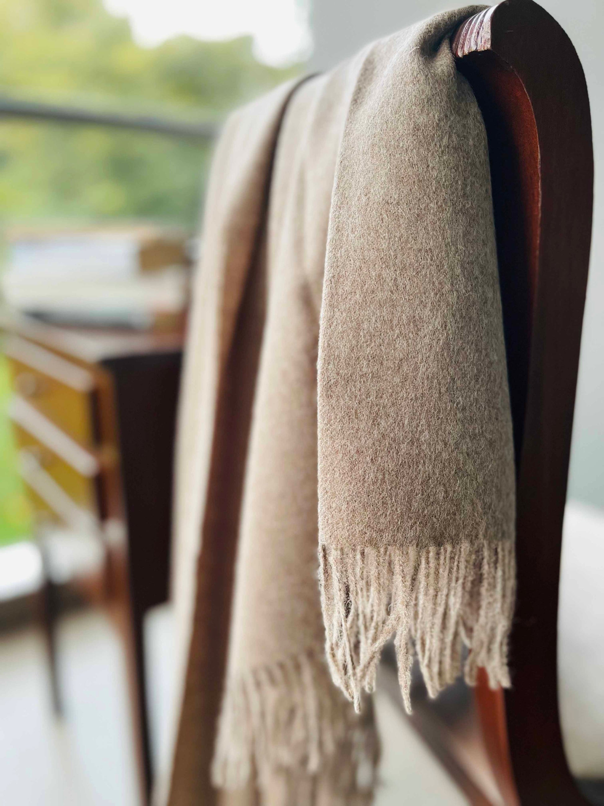 Blanket from alpaca wool in beige color
