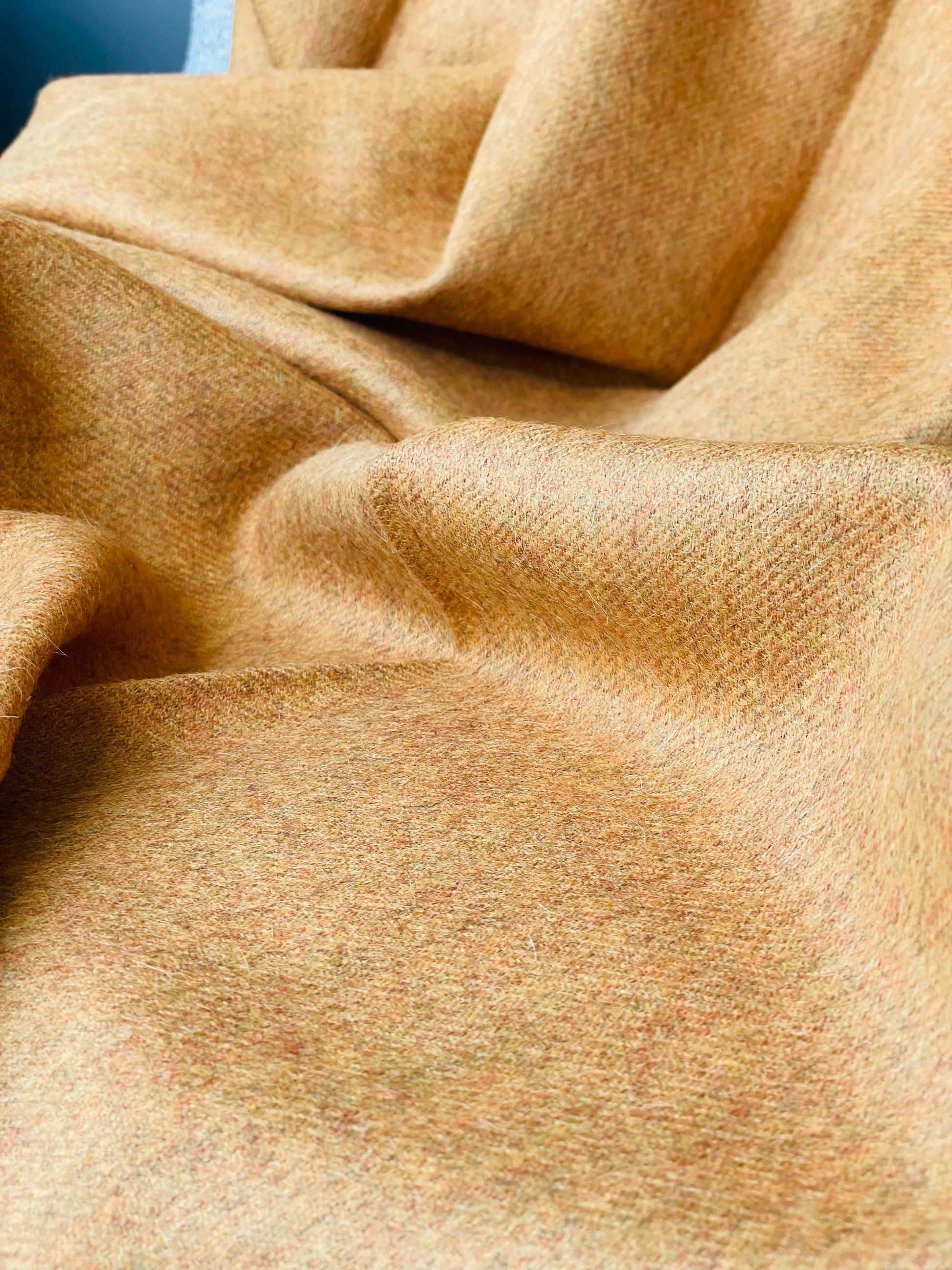 Blanket from alpaca wool in amber color
