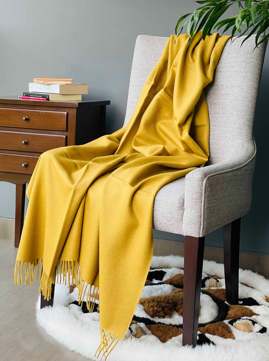 Blanket from alpaca wool in mustard color