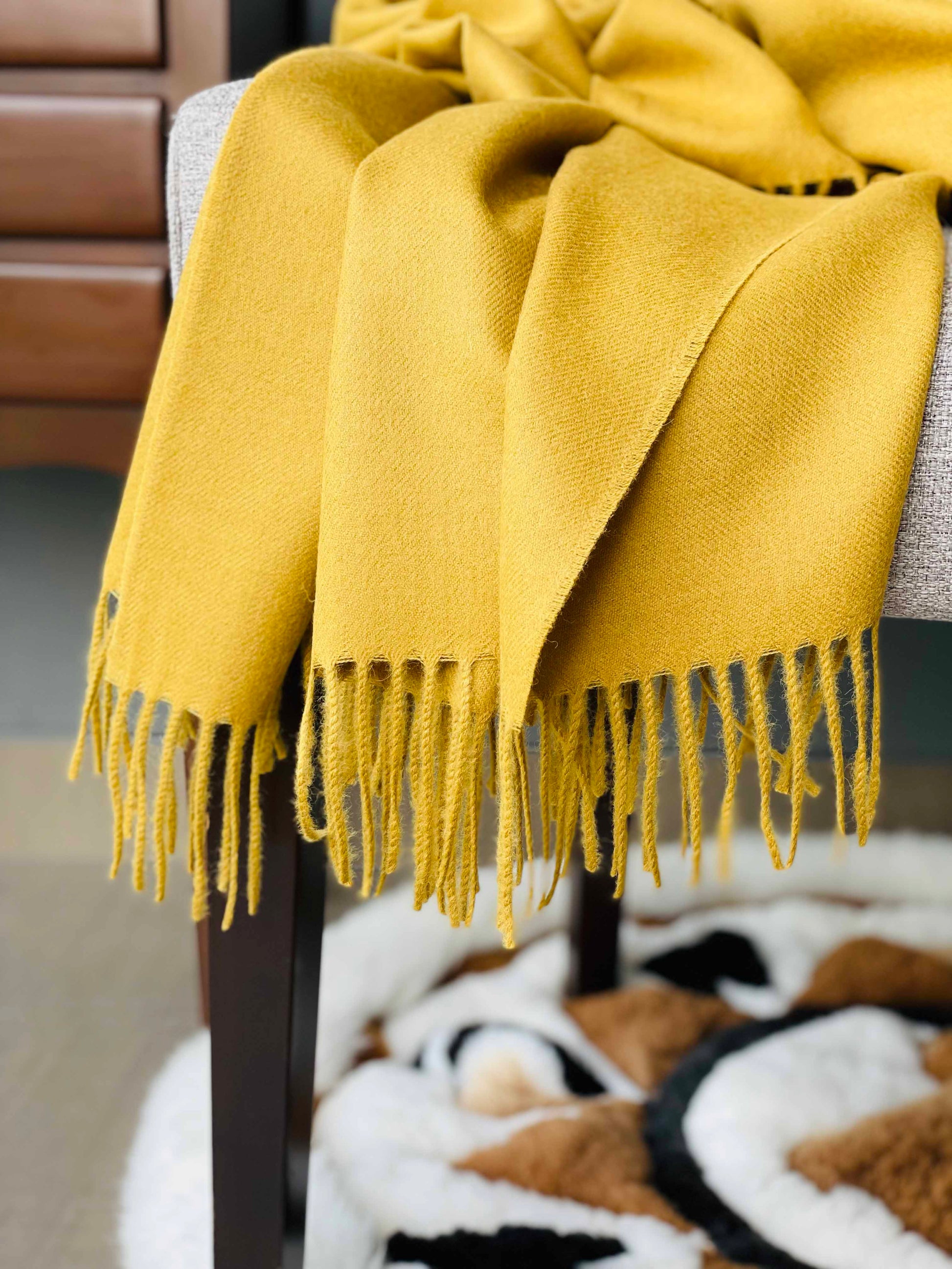 Blanket from alpaca wool in mustard color