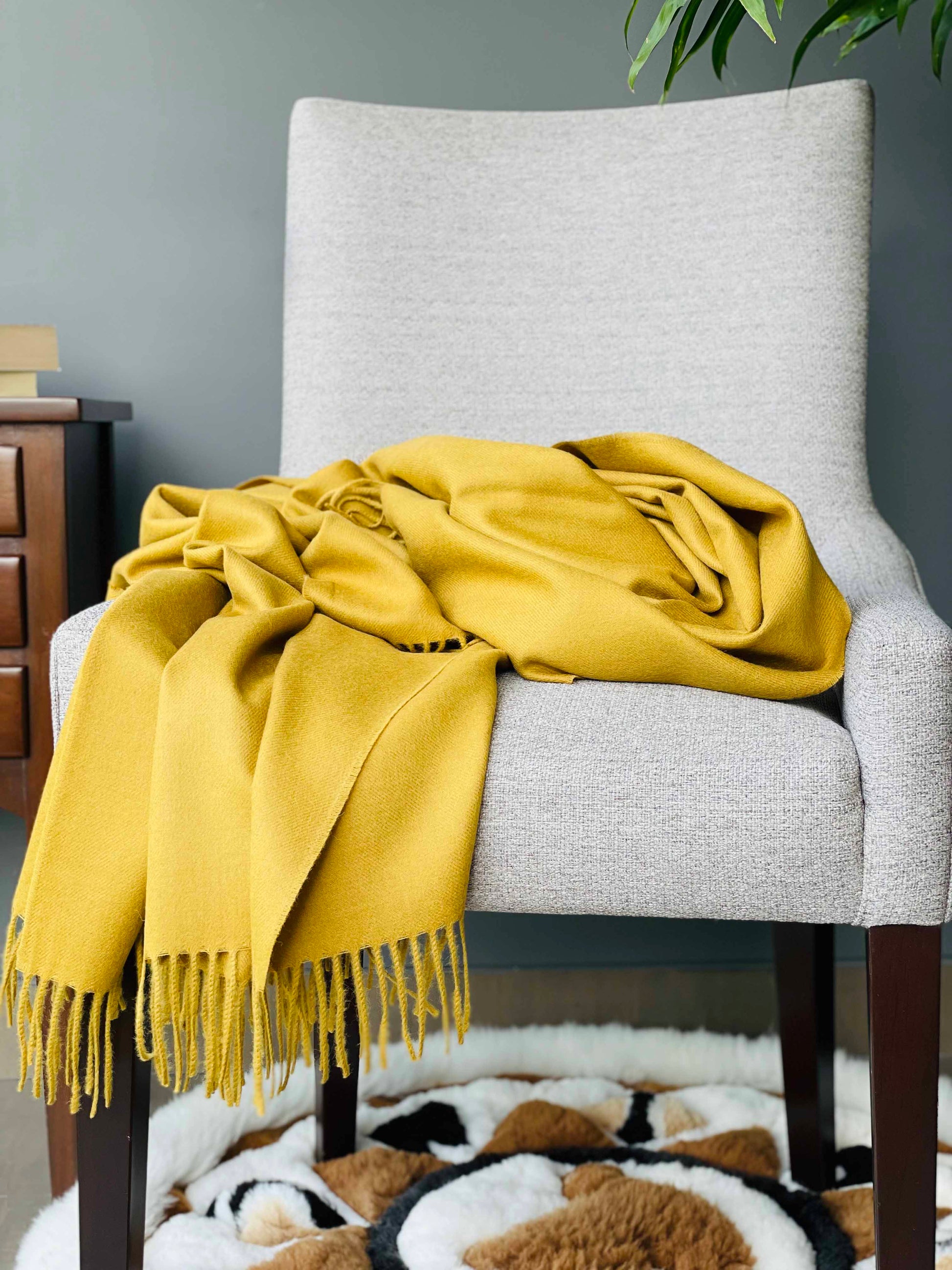 Blanket from alpaca wool in mustard color