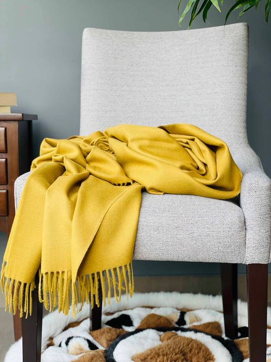 Blanket from alpaca wool in mustard color
