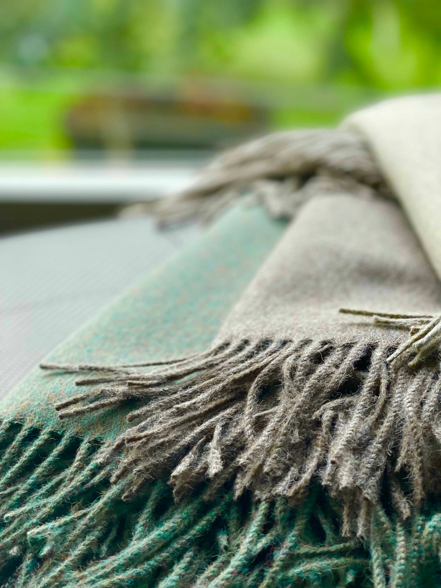 Blanket from alpaca wool in green and brown colors