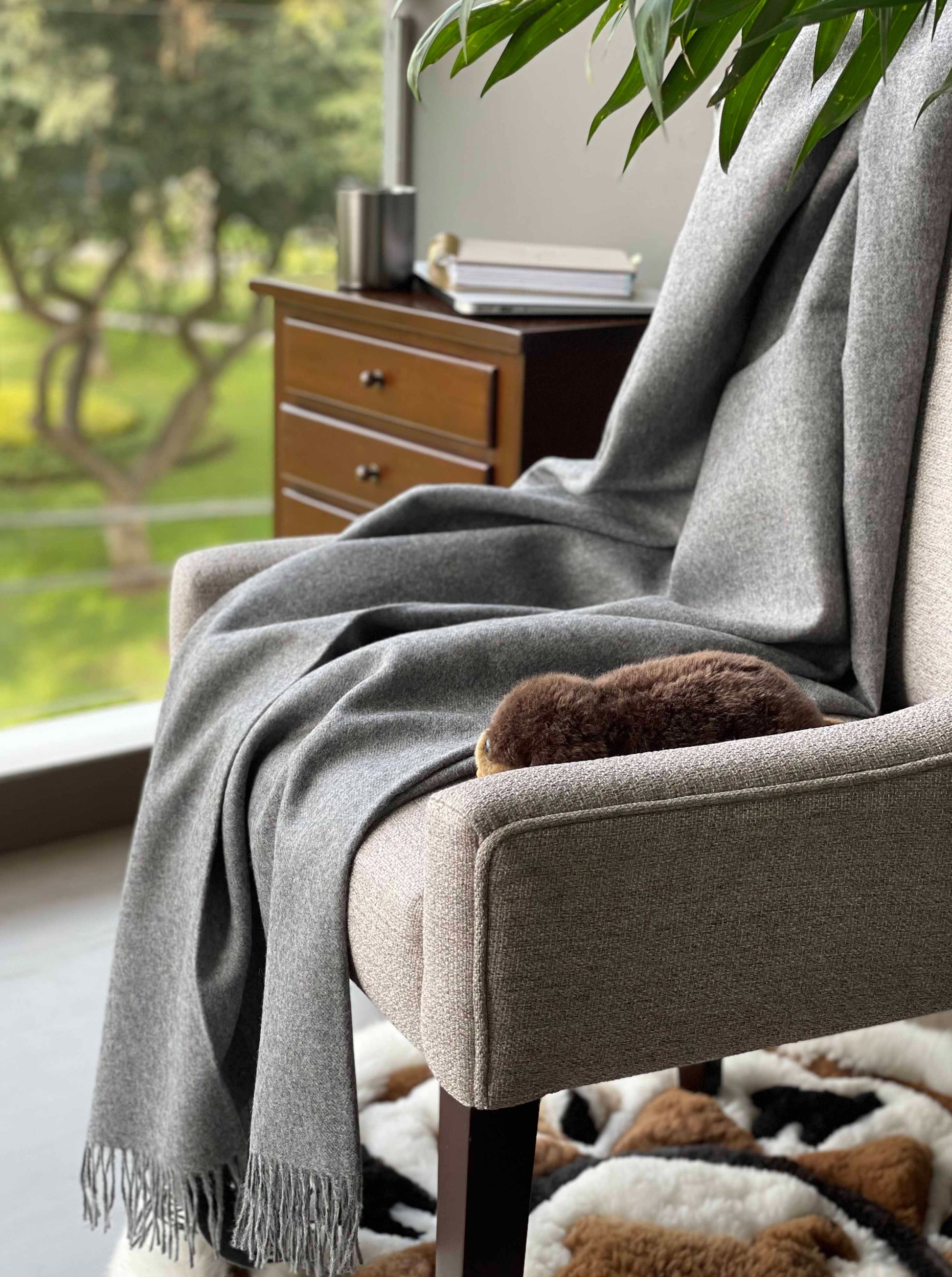 Blanket from alpaca wool in grey color