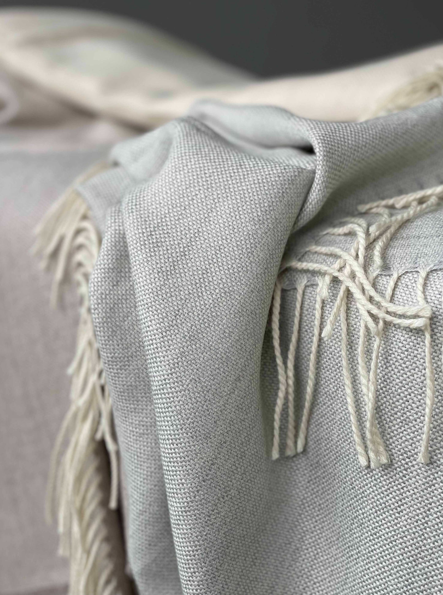 Blanket from alpaca wool in light grey color